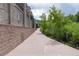 Stone building next to a walking path for resident enjoyment with lush vegetation surrounding the area at 640 11Th St # 302, Golden, CO 80401