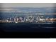 Daytime view of city skyline surrounded by treed landscape against an expansive horizon at 6066 Crawford Gulch Rd, Golden, CO 80403