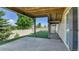 Backyard featuring a concrete patio, artificial turf, a fenced perimeter, and the home's underdeck at 5483 Ben Park Cir, Parker, CO 80134