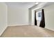 Bedroom offering neutral carpet, a window with black curtains, and ample space at 5483 Ben Park Cir, Parker, CO 80134