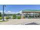 Outdoor community pool and lounge area with a covered pavilion at 5483 Ben Park Cir, Parker, CO 80134