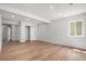 Finished basement offers a versatile space with a window and closet, perfect for a bedroom or recreation area at 1990 Ulster St, Denver, CO 80220