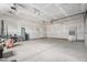 Spacious garage with drywall and overhead lighting, ready for customization and storage at 1990 Ulster St, Denver, CO 80220