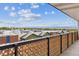 The balcony offers a scenic view of the horizon under a cloudy sky at 4570 E Yale Ave # 706, Denver, CO 80222