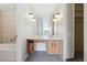 Bathroom with vanity, sink, and closet, providing storage and functionality at 4570 E Yale Ave # 706, Denver, CO 80222