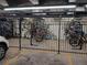 Secured bike storage area with racks and multiple bicycles parked at 4570 E Yale Ave # 706, Denver, CO 80222