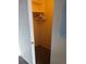 Small closet with wood floor and a single clothing rod at 4570 E Yale Ave # 706, Denver, CO 80222