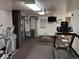Gym features equipment like treadmills, elliptical trainers, and weight machines at 4570 E Yale Ave # 706, Denver, CO 80222