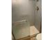 A bathroom shower with glass door and a modern shower head and tile surround at 4570 E Yale Ave # 706, Denver, CO 80222