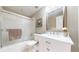 Bathroom featuring a glass shower door, a marble sink top and chrome fixtures at 6260 Rain Dance Trl, Littleton, CO 80125