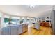Bright and airy kitchen with an open layout, granite countertops, and stainless steel appliances at 6260 Rain Dance Trl, Littleton, CO 80125
