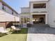 Backyard featuring patio area, synthetic turf, and grill with seating, great for entertaining at 5835 Chester Way, Denver, CO 80238