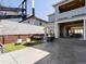Backyard featuring patio area, synthetic turf, and grill with seating, basketball court is visible at 5835 Chester Way, Denver, CO 80238