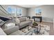 Bright game room with comfortable seating and various entertainment options at 5835 Chester Way, Denver, CO 80238
