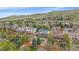 Pictureesque aerial view of homes with decks and tiered backyard landscaping at 15887 W Ellsworth Ln, Golden, CO 80401
