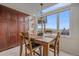 Bright breakfast nook with natural light, a chandelier, and a scenic view at 15887 W Ellsworth Ln, Golden, CO 80401