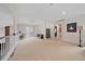 Open loft area with access to a balcony, providing a versatile space for relaxation or entertainment at 15887 W Ellsworth Ln, Golden, CO 80401
