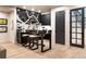 Modern bar with elegant marble backsplash, stylish shelving, and sleek seating for entertaining at 40 Royal Ann Dr, Greenwood Village, CO 80111