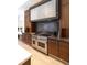 Contemporary kitchen features stainless steel Wolf range and oven, with custom cabinetry and countertops at 40 Royal Ann Dr, Greenwood Village, CO 80111
