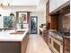 Stylish kitchen with stainless steel appliances, a large island with sink, and custom cabinetry at 40 Royal Ann Dr, Greenwood Village, CO 80111