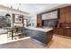 Modern kitchen features a large island with seating, sleek cabinetry, and stainless steel appliances at 40 Royal Ann Dr, Greenwood Village, CO 80111