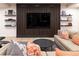 Comfortable living room with a modern TV setup, warm lighting, and plush seating at 40 Royal Ann Dr, Greenwood Village, CO 80111