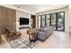 Cozy living room featuring a fireplace, stylish decor, and seamless indoor-outdoor flow for modern living at 40 Royal Ann Dr, Greenwood Village, CO 80111
