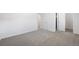 Neutral bedroom with a neutral carpet and a closet at 12648 W Virginia Ave, Lakewood, CO 80228