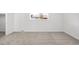 Carpeted bedroom featuring a window for natural light at 12648 W Virginia Ave, Lakewood, CO 80228