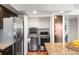 Convenient laundry area with modern washer and dryer, and ample storage space at 12648 W Virginia Ave, Lakewood, CO 80228