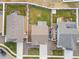 Aerial view of home showing the well-maintained backyard, neighboring properties, and surrounding landscaping at 1527 Biffle Ct, Berthoud, CO 80513