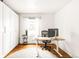 Bright office space with hardwood floors, and white walls, perfect for working from home at 945 Jackson St, Denver, CO 80206