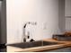 Close-up of modern sink with brushed metal faucet and light butcher block countertop at 945 Jackson St, Denver, CO 80206