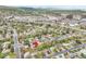 Expansive aerial view showcasing a vibrant community close to shopping centers and major roadways at 460 S Taft St, Lakewood, CO 80228