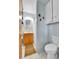 Cozy bathroom featuring a sink and shower at 460 S Taft St, Lakewood, CO 80228