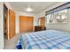 Comfortable bedroom featuring carpeted floors and a dresser at 460 S Taft St, Lakewood, CO 80228