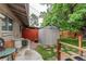 Backyard featuring a shed, patio area and walkways at 840 Essex Dr, Denver, CO 80229