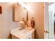 Bathroom featuring a vanity, sink, mirror, lighting, towel and neutral color scheme at 840 Essex Dr, Denver, CO 80229