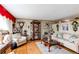 Cozy living room with classic furniture, decorative accents, and hardwood floors at 840 Essex Dr, Denver, CO 80229