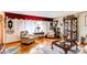 Bright living room with hardwood floors and charming decor at 840 Essex Dr, Denver, CO 80229