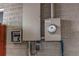 Exterior view of the home's utility meters and power systems at 840 Essex Dr, Denver, CO 80229