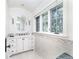 Well-appointed bathroom with white vanity and mosaic tile accents at 559 N Williams St, Denver, CO 80218