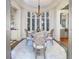 Round table, marble floor, bay window, French chairs at 559 N Williams St, Denver, CO 80218