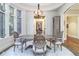 Round table, marble floor, bay window, French chairs at 559 N Williams St, Denver, CO 80218
