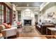 Comfortable living room with fireplace and built-in shelving at 559 N Williams St, Denver, CO 80218