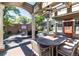 Covered patio with seating area and dining table at 559 N Williams St, Denver, CO 80218