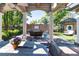 Covered patio with seating area and dining table at 559 N Williams St, Denver, CO 80218