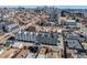 Stunning aerial view of modern townhomes in a vibrant neighborhood near the Denver skyline at 3520 W Conejos Pl # 11, Denver, CO 80204