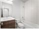 Updated bathroom features stylish vanity, modern fixtures, and subway tile shower over tub at 3520 W Conejos Pl # 11, Denver, CO 80204