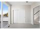 Bright bedroom with sliding doors to deck, plush carpet and closet space at 3520 W Conejos Pl # 11, Denver, CO 80204